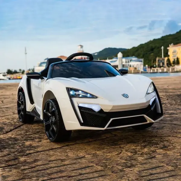 Дитячий електромобіль T-7623 EVA WHITE легковий на Bluetooth 2.4G Р/У 12V7AH мотор 2*35W з MP3