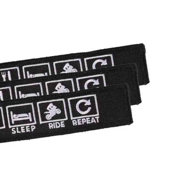 thumb_tkanevij_brelok_eat_sleep_ride_repeat_1.jpg ЇЖ СПИ ЇДЬ ПОВТОРЮЙ